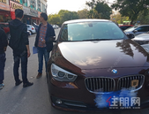 外墙瓷砖砸伤轿车，物业赔偿一万元