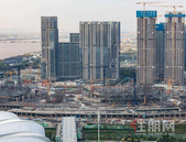 坚守房地产调控底线“纾困不**”