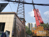 经过几十年风吹雨打 柳州东环路两座废弃铁塔被拆