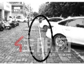 市政路被“圈”进小区停车场引质疑 柳州水龙居物业：无意占人行道