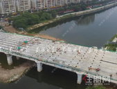 预计2022年元旦通车！这条横跨南流江的大桥箱梁架设完成